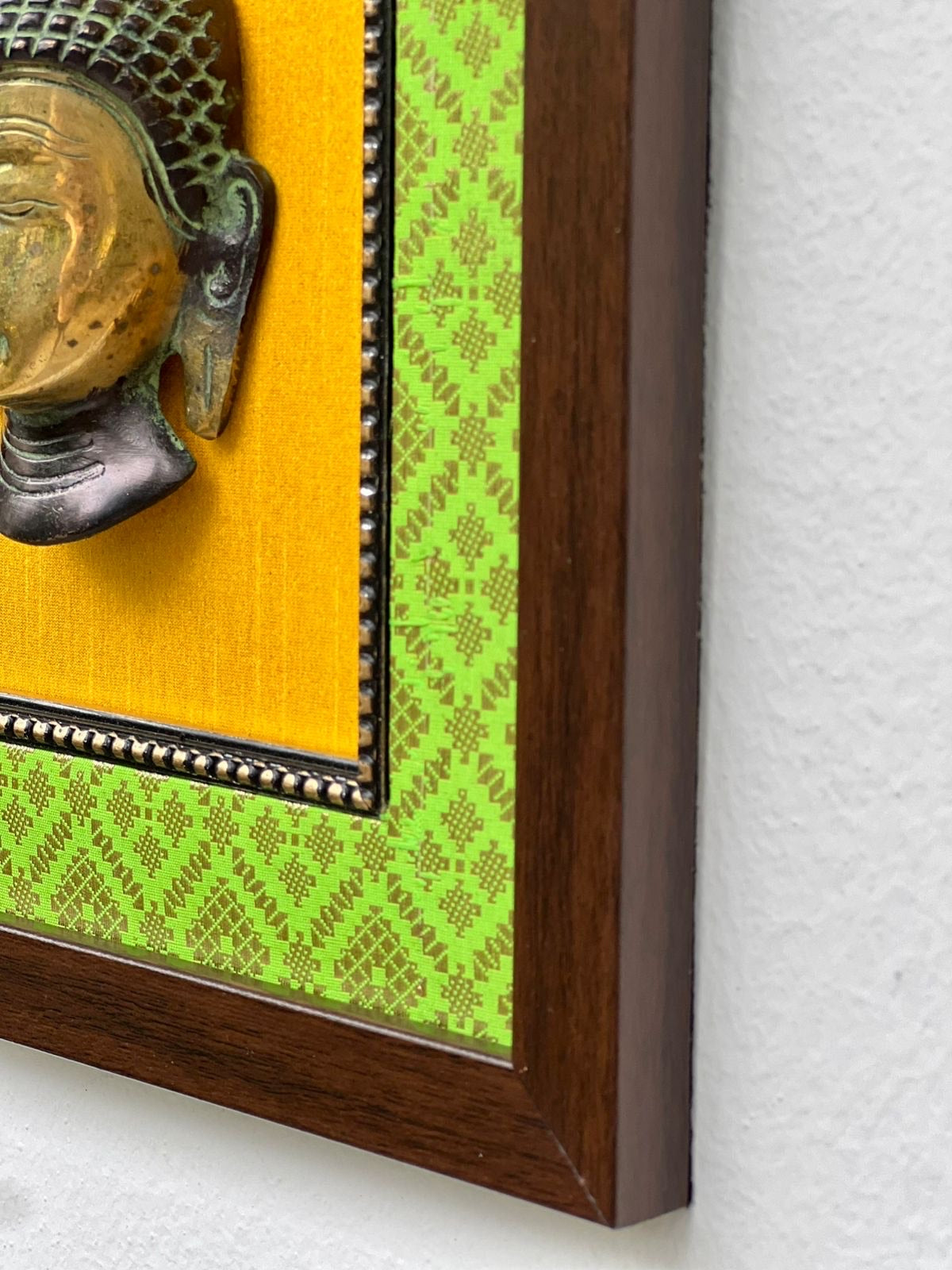 Elegant Brass Buddha Wall Frame – Green & Yellow Décor