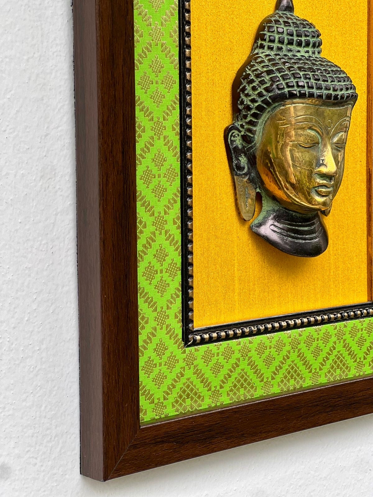 Elegant Brass Buddha Wall Frame – Green & Yellow Décor