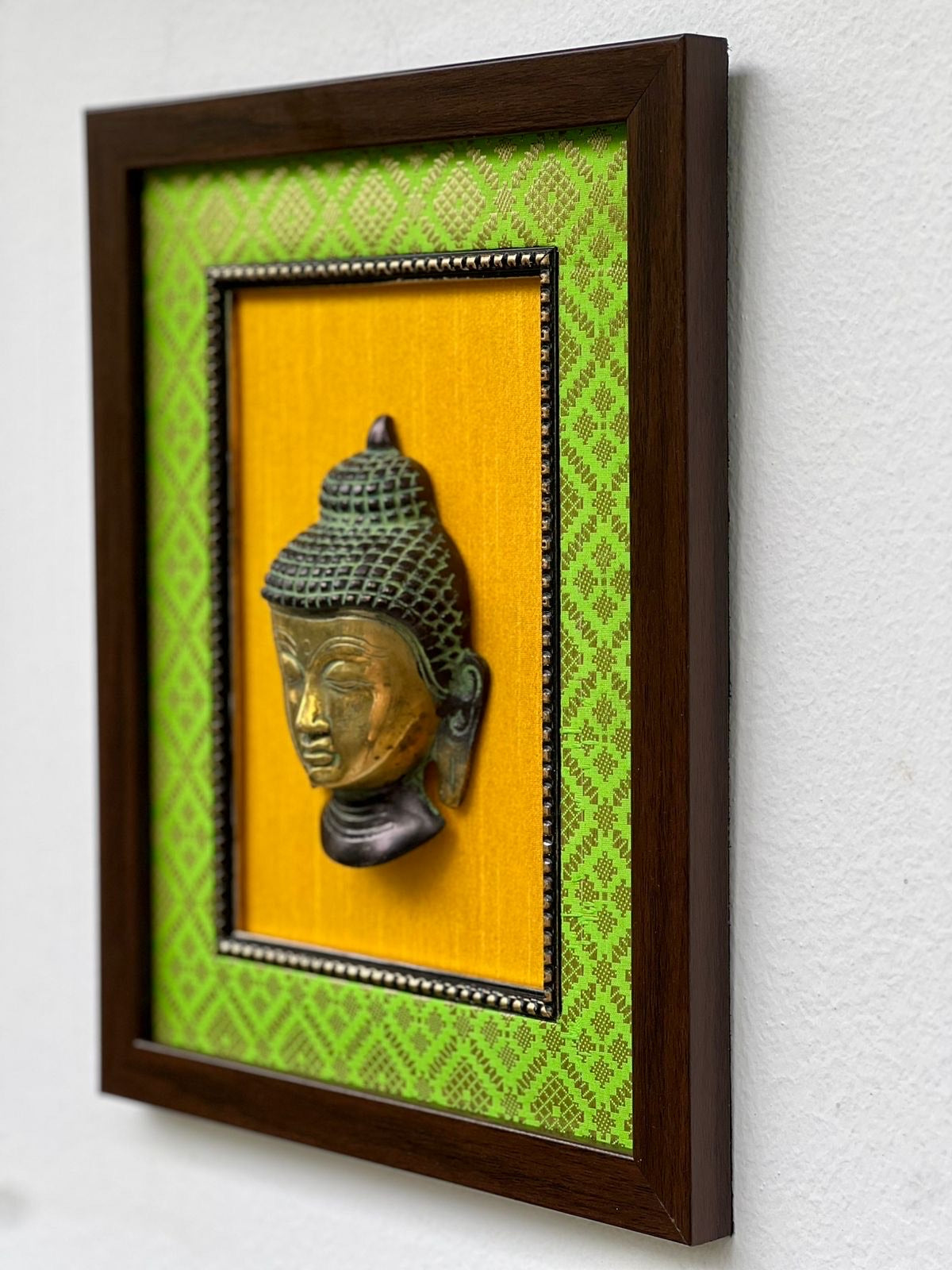 Elegant Brass Buddha Wall Frame – Green & Yellow Décor